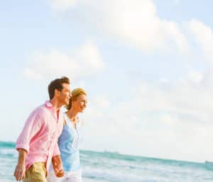 couple walking on Miami beach