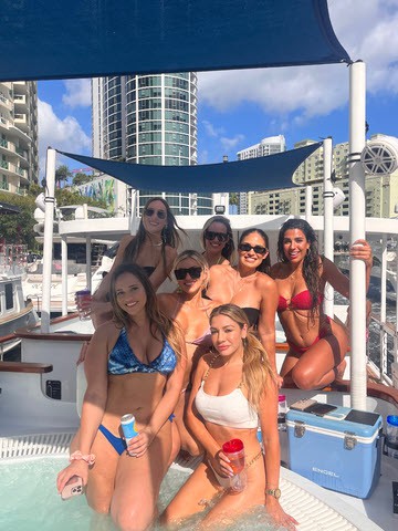 girls on hot tub boat