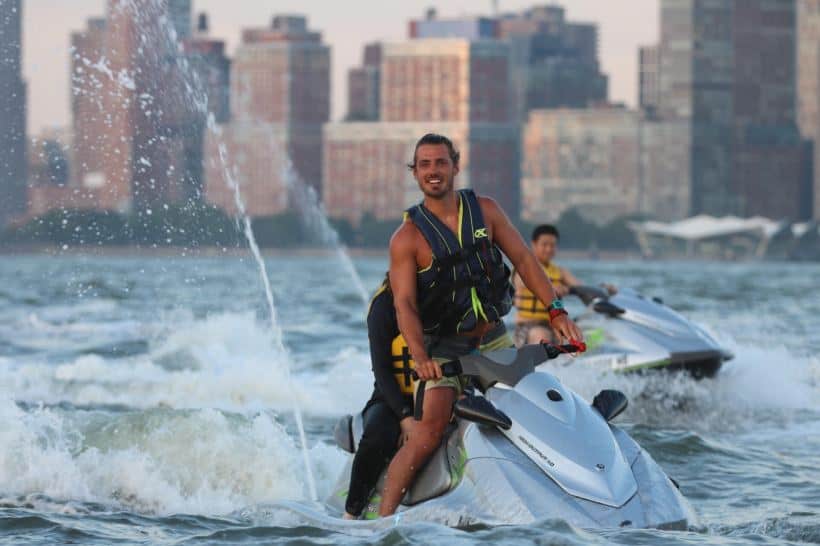 person returning on a jet ski